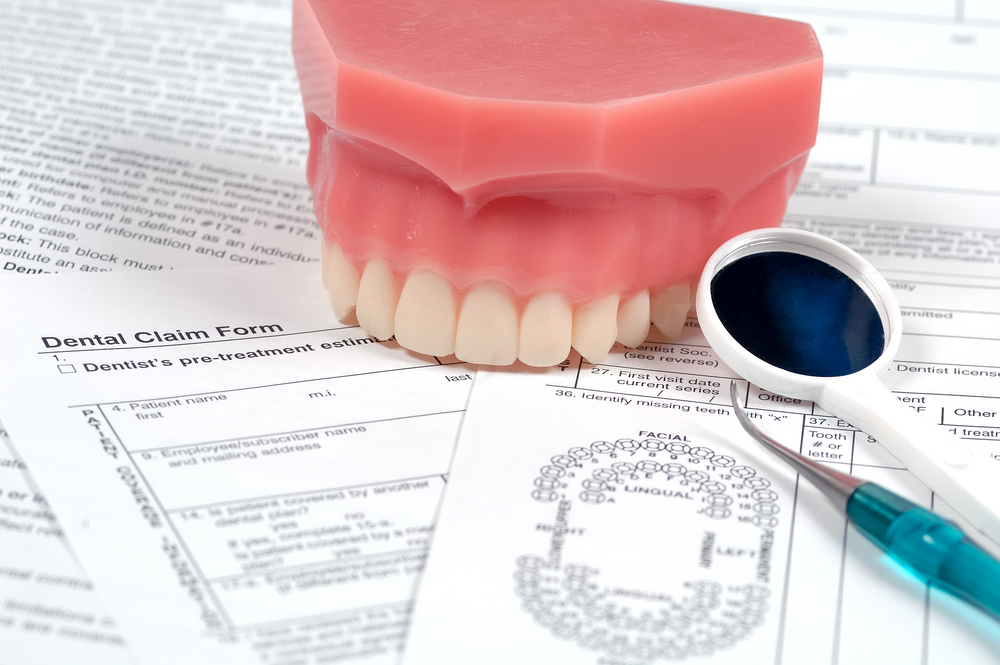 Dental Claim Form and Various Dental Instruments